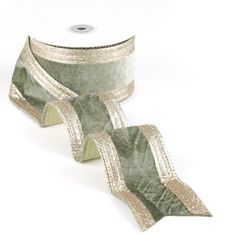 two rolls of silver and gold ribbon on white background