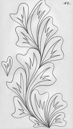 a black and white drawing of leaves