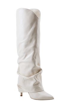 A slouchy shaft puts an exclamation point on the effortlessly chic design of a knee-high boot fashioned with a stiletto heel and pointy toe. 3 1/4" heel 15 1/2" shaft; 14 1/4" calf circumference Pull-on style Leather upper/textile and synthetic lining/synthetic sole Imported White Heeled Boots, Fold Over Boots, Fairy Shoes, Exclamation Point, Boots White, Places To Shop, White Heels, White Boots, Marc Fisher