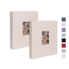 two white canvas album covers with an image of a woman holding a baby