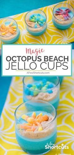 three cups filled with colorful jello and candy on top of a yellow table cloth