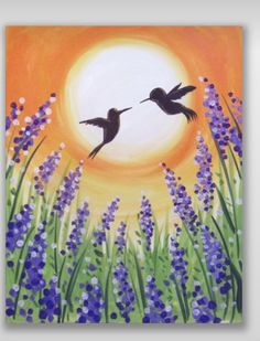 two birds are flying in the sky over purple flowers and grass, while the sun is setting