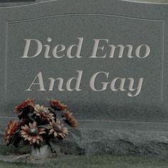 a headstone with flowers on it and the words died emo and gay