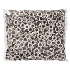 a bag filled with lots of silver colored metal eyeballs