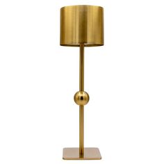 a gold lamp with a round shade on it