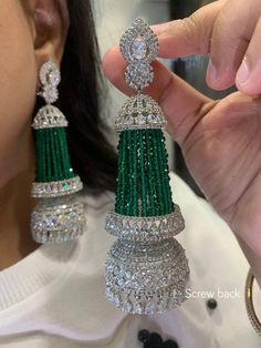 From classic solitaires to intricate patterns,
 discover the perfect blend of sophistication and glamour. Long Diamond Earrings, Diamond Jhumkas, Pakistani Jewelry