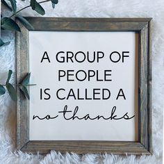 a group of people is called a no - thanks sign in a frame on a white rug