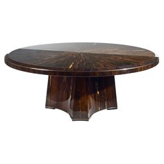 a round wooden table with an intricate design