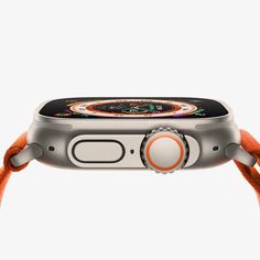 an apple watch with orange straps attached to it