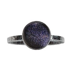 "Night Sky Constellation Solitaire Ring | Sterling Silver & Blue Goldstone Paisley Pattern Band | Star Starry Galaxy Space | USA Sizes 4-12 The Night Sky Constellation Solitaire Ring! This gorgeous ring is handcrafted from Sterling Silver and features a stunning Blue Goldstone gemstone. The dark blue, almost black, color of the gemstone is reminiscent of a starry night sky, and it sparkles like the stars above. The band of the ring has a beautiful paisley pattern that adds a touch of elegance to this already stunning piece. Capture the magic of stargazing with this exquisite Night Sky Constellation Ring. Perfect for anyone who loves astronomy or gazing at the night sky, this ring is sure to be treasured for years to come.  *Goldstone is said to be the stone of ambition. It builds energy, c Constellation Ring, Gorgeous Ring, Blue Goldstone, Golden Jewelry, Monogram Jewelry, Paisley Pattern, Ring Sterling Silver, Silver Blue, Solitaire Ring