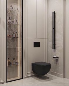 a modern bathroom with white walls and black accents