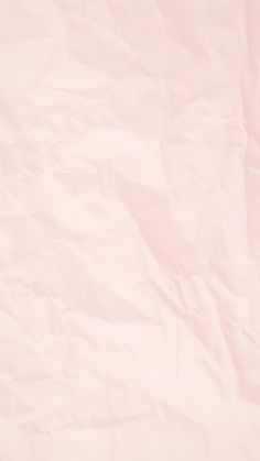 an image of a pink paper textured with some sort of cloth or tissue material