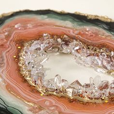 a piece of art that looks like it has been made out of agate and gold