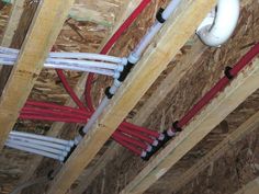 some red and white wires are in the ceiling