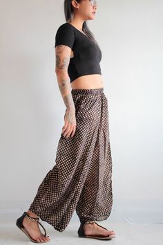 "Thin and flowvy. Perfect for hot days! Made from Indian cotton-voiled fabric. Lovely, breathable and so so flown. With print that looks hand-painted. Thin but not a see-thru. Leisuring lounge pants style. So comfortable and earthy. Drop crotch with.2 pieces of leg patch together in an untraditional way. We play around with the pattern and it turns out good! Elastic waist, 2 side pockets, gathered a bit on the bottom hem for volume. Measurement; Waist (elastic) 24-28 Hip max 36 Length out-seam 3 Pants Summer, Womens Capris, Pants Style, Summer Pants, Indian Cotton, Hot Days, Cotton Pants, Lounge Pants, Fashion Pants