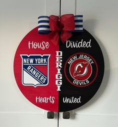 a hockey puck hanging on the side of a wall with other sports related items attached to it