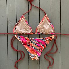 Enjoy the outdoors in one of our best selling bikini tops. This super cute versatile animal print triangle bikini top can be matched with our pink and brown animal print spaghetti bikini bottoms. Made with the finest quality of soft and stretchy Lycra. DM @jillesbikinis on Instagram for inquiries. Pink Triangle Swimwear For Spring, Multicolor Triangle Swimwear For Summer, Multicolor Triangle Swimwear Beachwear, Multicolor Triangle Swimwear For Beachwear, Multicolor Triangle Beachwear Swimwear, Tropical Triangle Swimwear For Summer, Pink Triangle Swimwear, Multicolor Triangle Swimwear For Sunbathing, Pink And Brown