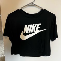 Nike Cropped Tee Size Small Never Worn Nike Black T-shirt For Spring, Trendy Nike Sports Tops, Black Sports T-shirt For Spring, Trendy Nike Short Sleeve Tops, Nike Basic Tops With Letter Print, Trendy Nike Tops With Graphic Print, Nike Basic Top With Graphic Print, Basic Nike Tops With Letter Print, Trendy Nike Top With Graphic Print