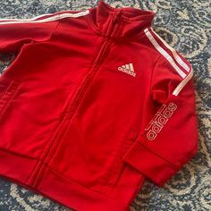 Nwot: Adidas Baby Zip Hoodie. Sz 12mo. Red. Side Pockets. 100% Polyester. All Bundles Are Discounted Red Outerwear For Playtime In Fall, Red Outerwear For Fall Playtime, Red Tops For Fall Playtime, Red Cotton Outerwear For Playtime, Adidas Red Winter Tops, Red Adidas Tops For Winter, Red Winter Playwear Tops, Adidas Baby, Adidas Sweatshirt