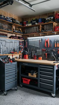 a garage filled with lots of tools and workbenches