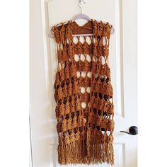 Do you love boho style? If so this vest is for you white and spring colors with fringe. ~~Measurements~~ 40 inches long (including fringe) ~~Size~~ S/M Please feel free to message me for custom colors and sizes. I love to crochet. Sleeveless Crochet Top With Crochet Trim For Fall, Fall Sleeveless Crochet Top With Crochet Trim, Bohemian Crochet Top With Crochet Trim For Fall, Bohemian Crochet Top For Fall, Hippie Crochet Top For Fall, Fitted Bohemian Crochet Top For Fall, Bohemian Crochet Top For Fall Vacation, Fall Vacation Bohemian Crochet Top, Bohemian Brown Crochet Top For Festival