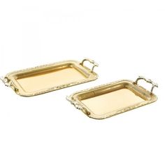 two gold trays with handles and handles