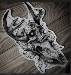 a drawing of a deer skull with antlers on it