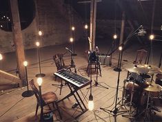 a recording studio with musical instruments and lights