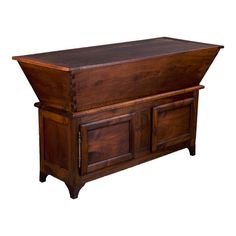 a large wooden chest with two doors and drawers