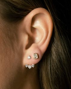 Design A graduating diamond ear jacket - the perfect accessory to add some extra bling to your own diamond studs. We recommend to order in the same metal color as your own studs. Details & Dimensions 0.70 carats (pair), 0.35 carats (single) Earring Jackets, Fancy Earrings, Ear Jacket, Recycled Gold, Conflict Free Diamonds, Metal Color, Diamond Studs, Online Jewelry, Diamond Jewelry