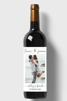 a bottle of wine with an image of a couple kissing on the front and bottom