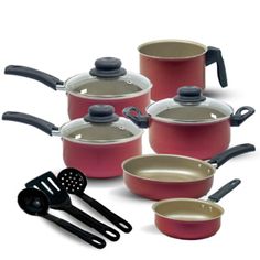 a group of pots and pans sitting next to each other