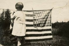 Perhaps laundering the flag for proper display. Old American Flag, Touching Photos, Vintage Housewife, The American Flag, Vintage Americana, Old Glory, Founding Fathers, American Pride