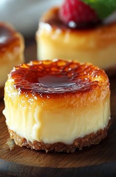 two desserts on a wooden plate with fruit