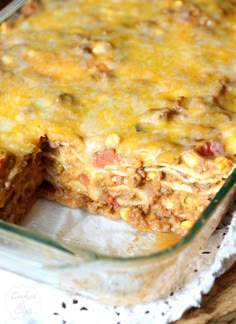 a casserole dish with meat and cheese in it