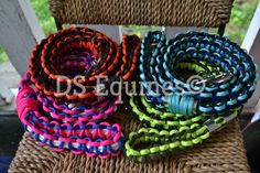 several different colored bracelets sitting on top of a wicker chair