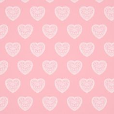 a pink background with white hearts on it