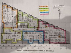 an architectural drawing shows the floor plan for a building with multiple floors and different colored sections