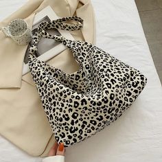 SPECIFICATIONS Lining Material: POLYESTER Shape: Bucket Main Material: CANVAS Style: fashion Closure Type: hasp Pattern Type: LEOPARD Gender: WOMEN Hardness: SOFT [20240301] Diesel Bag, Cheap Bags, Luxury Designer Handbags, Shopping Tote Bag, Womens Fashion Casual, Canvas Bag, Shoulder Handbags, Cloth Bags, Womens Backpack