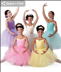 four young ballerinas posing for the camera