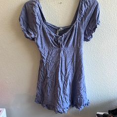 Never Worn But No Tags . Great Condition Just A Little Wrinkly. Fits More Like An Xs Casual Blue Floral Mini Dress, Blue Cotton Mini Dress With Short Sleeves, Blue Short Sleeve Sundress, Blue Casual Mini Dress With Short Sleeves, Blue Flowy Mini Dress With Short Sleeves, Flowy Cotton Mini Dress In Blue, Casual Flowy Light Blue Mini Dress, Blue Short Sleeve Summer Mini Dress, Flowy Blue Cotton Mini Dress