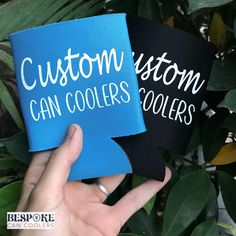 two blue and black can coolers that say custom, can coolers are cool