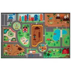 a children's play mat with lots of different vehicles and buildings on the ground