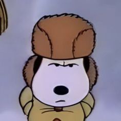 a cartoon dog with a hat on its head