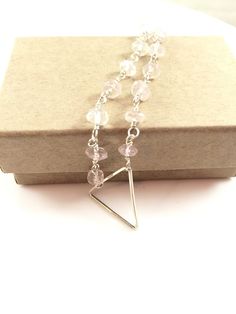 Rose quartz gemstone wire wrapped bracelet with handmade sterling silver triangle-sterling silver-geometric-triangle-audriasprettypieces Wire Wrapped Bracelet, Geometric Triangle, Rose Quartz Gemstone, Handmade Sterling Silver, Wire Wrapped, Wire Wrapping, Rose Quartz