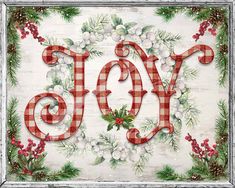 the word joy is decorated with holly and berries