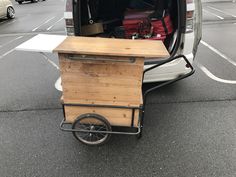 the back end of a van with an open trunk