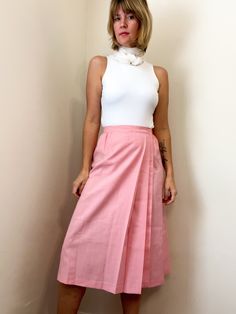 "⚡️ sweet high waisted a-line wrap skirt with accordion pleats at the front. beautiful soft pink color. made by Fundamental Things. 50% polyester 50% rayon. excellent condition! ⚡️ labeled size 14 (modeled on size small, 5'5\") ⚡️ waist 15\"  hips 19.5\" length 27.5\" ------------------------------------------------------------------------------------------- Please message questions prior to purchase. Once shipped, sales are final, no return/exchange. But please contact me if you have any proble Pink Pleated A-line Skirt, Feminine A-line Pleated Skirt, Pink A-line Pleated Skirt, Feminine Pleated Waist Bottoms For Summer, Fitted Box Pleat Midi Skirt, Fitted Pleated Wrap Skirt For Summer, Feminine Bottoms With Pleated Waist For Summer, Feminine Summer Bottoms With Pleated Waist, Fitted Summer Wrap Skirt Pleated