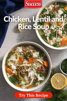 two bowls of chicken, lentil and rice soup on a table with lemon wedges