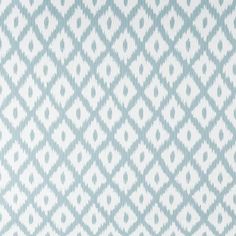 a blue and white pattern on fabric